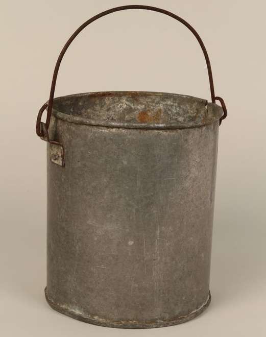 Tin pail made by a prisoner in Kaufering